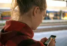 woman holding phone