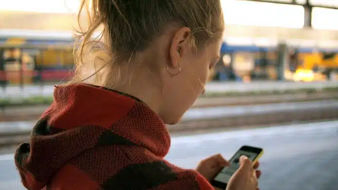 woman holding phone